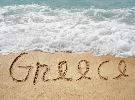 Grækenland skrevet i sandet på stranden